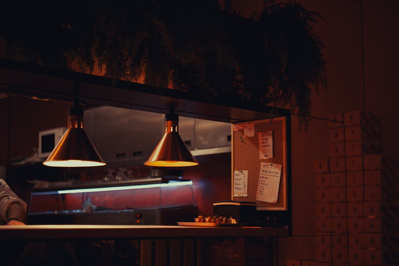 Church's Chicken team members working together in a warm community kitchen