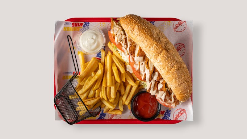 Honey Butter Chicken Sandwich with sauce drizzle